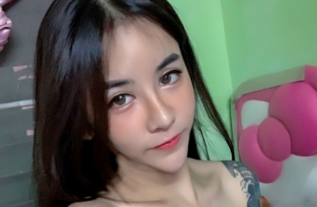 Pretty Asian shemale Nany displays her cleavage in her compilation