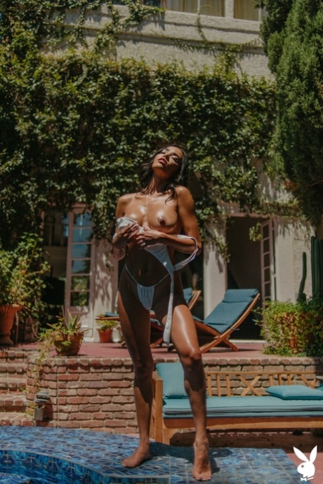 Glamorous bikini models posing provocatively in a Playboy compilation
