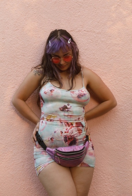 Purple haired hippie fatty Bubble Butt Venus flaunts her big tits in a solo