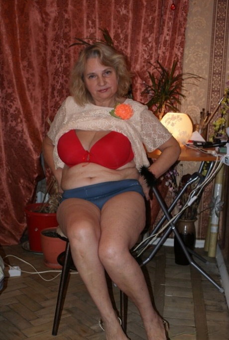 Amateur granny Helga strips naked & shows her huge saggy tits & hairy holes