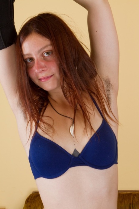 Amateur teen with a chest tattoo Vanessa exposes her bush and stretches it