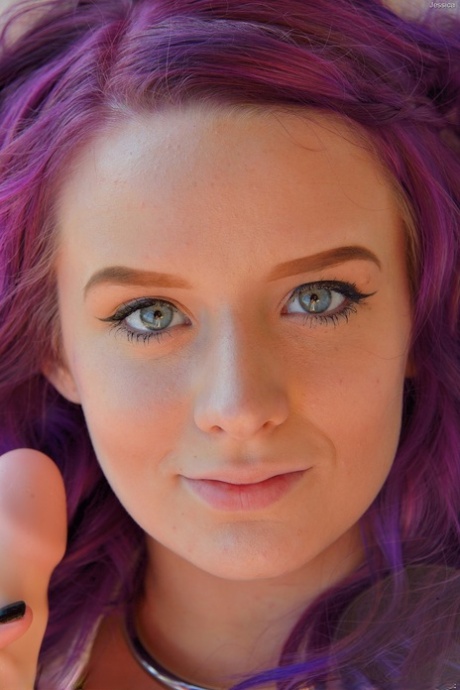 Purple haired babe Jessica doffs her denim shorts and gets her twat fisted