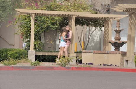 Sweet amateur babes Amber and Anna kiss each other's twat in the street