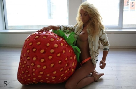Marvelous teen blonde Reuty bares her new silicone tits and sexy body