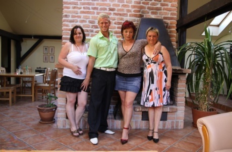 Kinky matures with huge boobs share a blond guy's stiff rod in a foursome
